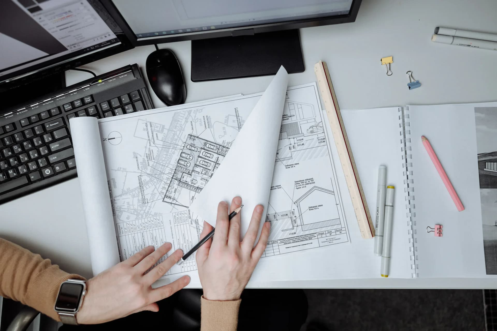Architectural plans being reviewed during project consultation